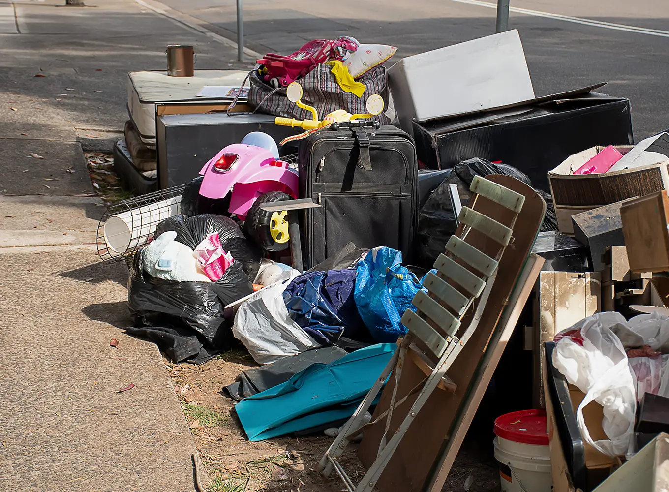 junk on a residential street ready for removal collinsville il